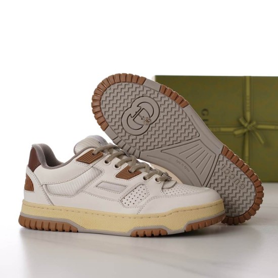 Gucci trainer showing the treaded brown sole design alongside the shoe body in white and brown