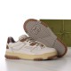 Gucci trainer showing the treaded brown sole design alongside the shoe body in white and brown