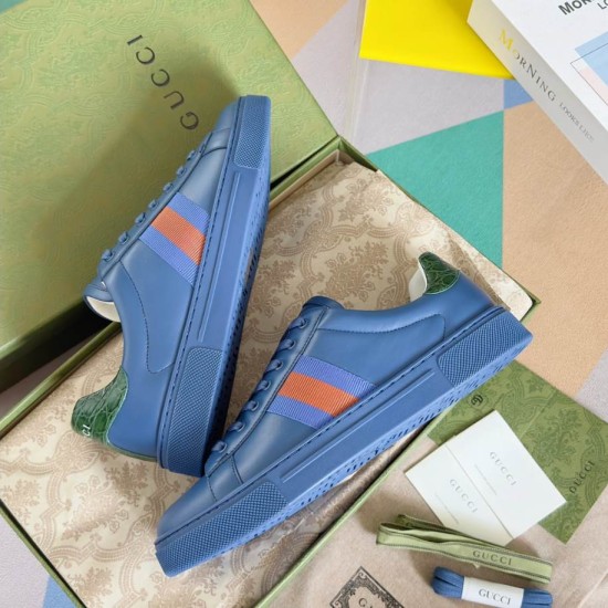 Gucci Ace Blue Leather Trainers In Box in blue and green Pair of Gucci Ace blue leather trainers presented inside green luxury shoe box