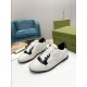Gucci Mac80 Front Perspective in off-white and black Front perspective view of off-white leather trainers with black eyestay overlays