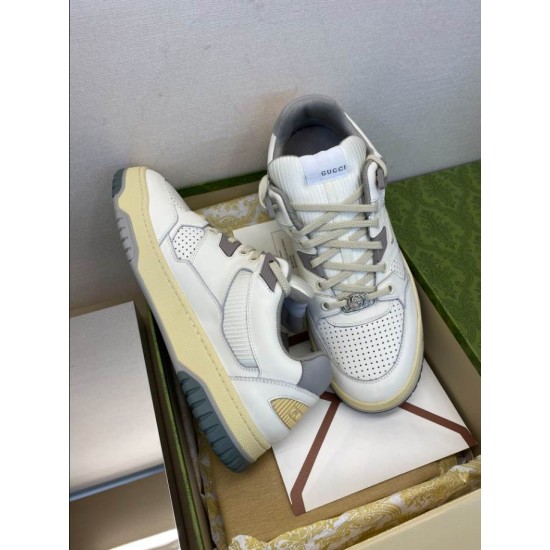 Gucci Distressed Trainers Packaging View in white and grey Gucci white and grey leather trainers inside presentation box with accessories