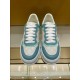 Gucci Monogram Canvas Trainers Front View in blue and white Front view of both blue and white Gucci monogram low-top trainers with white laces