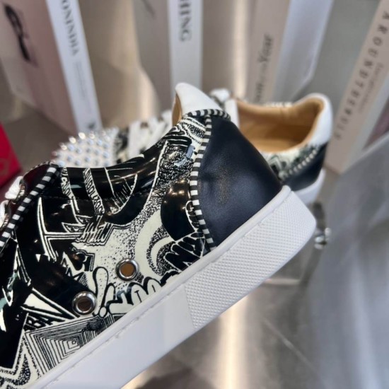 Christian Louboutin Graphic Print Detail View in black and white Close-up detail of side panel pattern and white sole on Christian Louboutin trainer in black and white