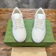Gucci White Leather Low Top Trainers Front View in white and green Gucci White Leather Low Top Trainers front top-down view showing laces and perforated toes in white and green