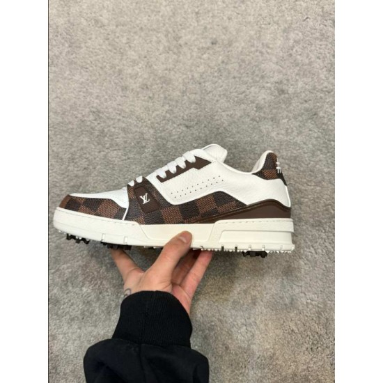 L Trainer Damier Leather White Brown Low Top Trainers Medial View Medial side view of L Trainer Damier leather white brown low top trainer highlighting side perforations and cleated outsole base