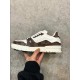 L Trainer Damier Leather White Brown Low Top Trainers Medial View Medial side view of L Trainer Damier leather white brown low top trainer highlighting side perforations and cleated outsole base
