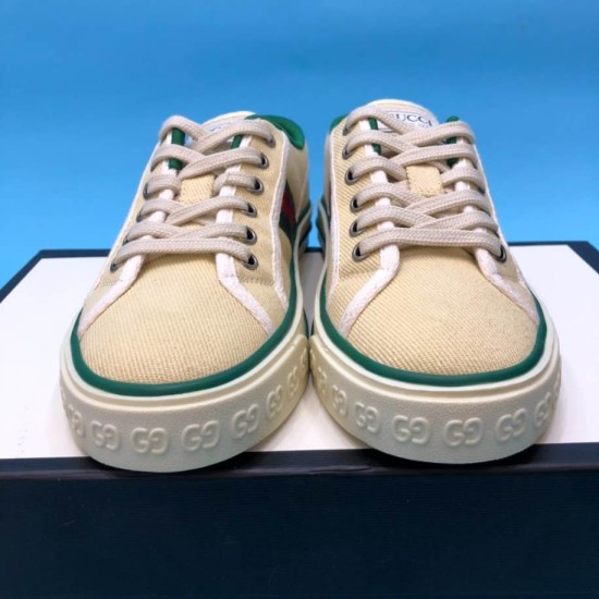 Gucci Off The Grid Canvas Low Top Trainers Beige Front Angle in beige and green Front view of Gucci Off The Grid Canvas Low Top Trainers Beige with laces and GG embossed toe cap in beige and green