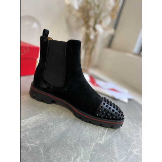 Christian Louboutin Men's Black Studded Suede Chelsea Boots Outer Side Outer side perspective of Christian Louboutin Men's Black Studded Suede Chelsea Boot with elastic side gore
