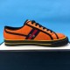 Gucci Off The Grid Orange Low Top Medial Profile Inner side view of Gucci Off The Grid Orange Canvas Low Top Trainer with eyelets