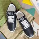 Gucci Black Leather Low Top Trainers overhead view of perforated toe box in black and white