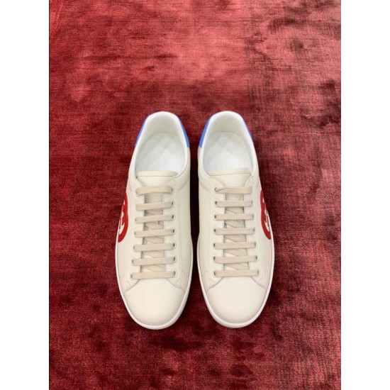 Gucci Ace Interlocking G Trainers Top View in off-white and red Top-down view of both white Gucci Ace Interlocking G leather trainers with laces tied in off-white and red