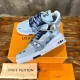 Overhead Angle of L Bleached Monogram Denim Blue Low Top Trainers Three-quarter overhead view of L bleached monogram denim blue low top trainers