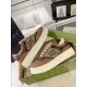 Gucci Brown Monogram Trainers Profile View in brown and green Side profile pair view of Gucci brown monogram trainers displayed together in brown and green