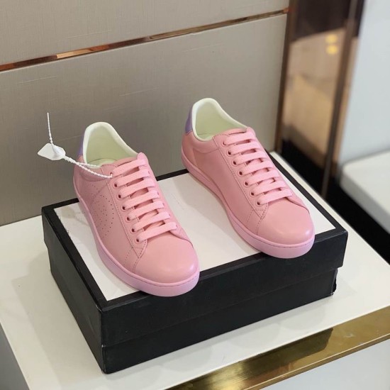 Gucci New Ace Pink Trainers Top View in pink and purple Top view of both Gucci New Ace pink leather trainers placed on a black shoe box in pink and purple