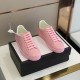 Gucci New Ace Pink Trainers Top View in pink and purple Top view of both Gucci New Ace pink leather trainers placed on a black shoe box in pink and purple