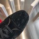Christian Louboutin Black Crystal Toe Cap Top View Top-down view of black crystal embellishments on the toe cap and suede eyestay