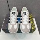 Front View of Gucci Gazelle White Trainers in white and black Front view of both Gucci Gazelle white leather trainers displaying laces and tongue logo in white and black