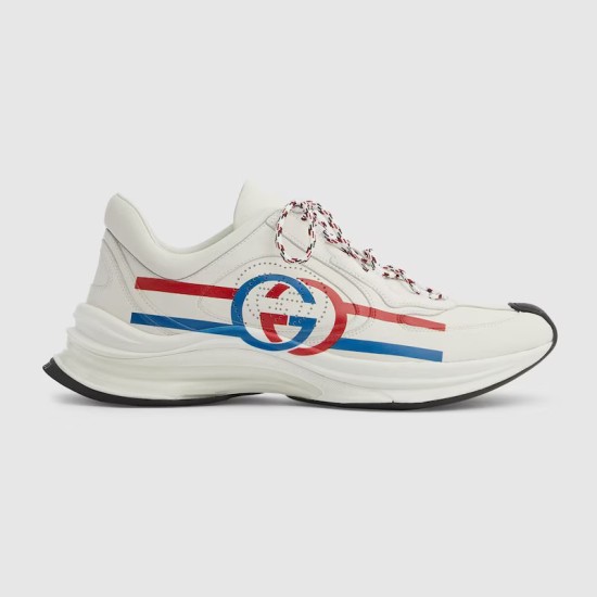 Gucci Run Leather Trainers In White Side View in white and red Gucci Run Leather Trainers In White profile view displaying red and blue Interlocking G side graphics