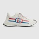 Gucci Run Leather Trainers In White Side View in white and red Gucci Run Leather Trainers In White profile view displaying red and blue Interlocking G side graphics