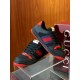 Gucci black and red web low top trainers stacked profile view