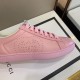 Gucci Perforated Logo Motif Side Detail in pink and purple Detailed view of the perforated logo motif on the side of the Gucci pink leather trainer in pink and purple