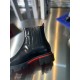 Christian Louboutin Men's Black Leather Chelsea Boots Panel Detail Close-up side view showing the stitched elastic side panel and red sole lining on Christian Louboutin Men's Black Leather Chelsea Boots.