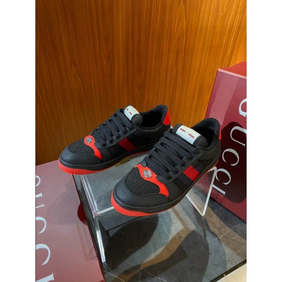 Gucci black and red web low top trainers front angle view