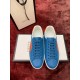 Blue Leather Trainers Overhead View in blue and orange Overhead pair view of blue leather trainers displaying tonal laces and smooth uppers in blue and orange