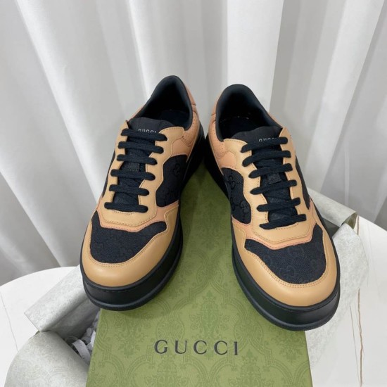 Gucci Monogram Leather Chunky Sole Trainers Black Brown Front Pair Front pair view of Gucci Monogram Leather Chunky Sole Trainers in black and brown resting on a green box