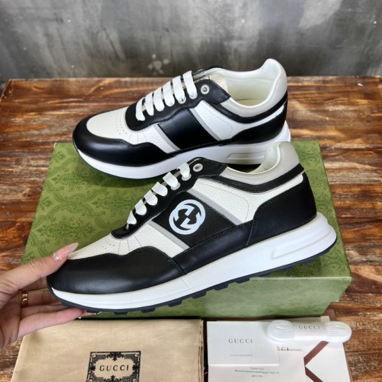 Gucci Leather Low Top Trainers Black White outer side panel and logo emblem