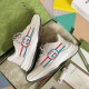 Gucci Run Leather Trainers In White Boxed View in white and red Gucci Run Leather Trainers In White lying inside open box highlighting red and blue side stripes