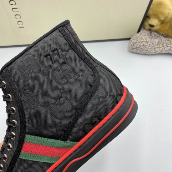 Gucci Off The Grid Black Canvas Upper Detail in black and red Close-up detail of black GG monogram canvas upper and green-and-red Web stripe on Gucci trainer
