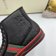 Gucci Off The Grid Black Canvas Upper Detail in black and red Close-up detail of black GG monogram canvas upper and green-and-red Web stripe on Gucci trainer