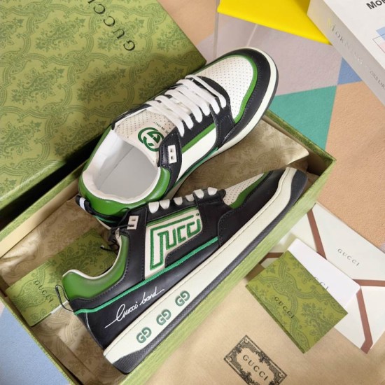 Gucci Screener Leather Trainers Green Black White resting in box packaging
