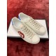 Gucci Ace Interlocking G Trainers on Box in off-white and red Pair of off-white Gucci Ace Interlocking G leather trainers resting on top of packaging box in off-white and red