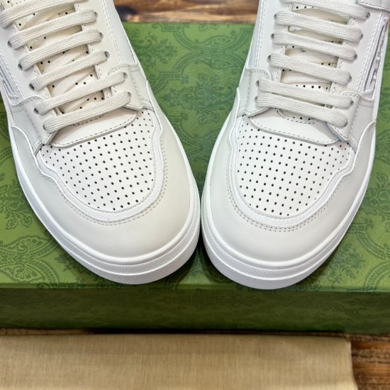 Gucci White Leather Low Top Trainers Toe Detail in white and green Gucci White Leather Low Top Trainers close-up view of perforated toe vamps and lacing in white and green