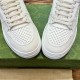 Gucci White Leather Low Top Trainers Toe Detail in white and green Gucci White Leather Low Top Trainers close-up view of perforated toe vamps and lacing in white and green