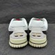 Gucci Re-Web GG Canvas Trainers Heel View in beige and white Rear heel view of Gucci Re-Web GG Canvas Trainers showing gold-tone logo badge and white leather counter in beige and white