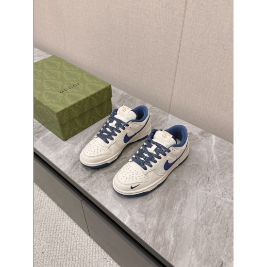 Gucci Low Top Leather Trainers In White And Blue Angle View High angle perspective of Gucci Low Top Leather Trainers In White And Blue beside box
