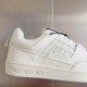 Gucci Leather Trainer Detail View in white and gold Detailed view of white leather upper featuring stitched branding panel and embossed sole motifs in white and gold