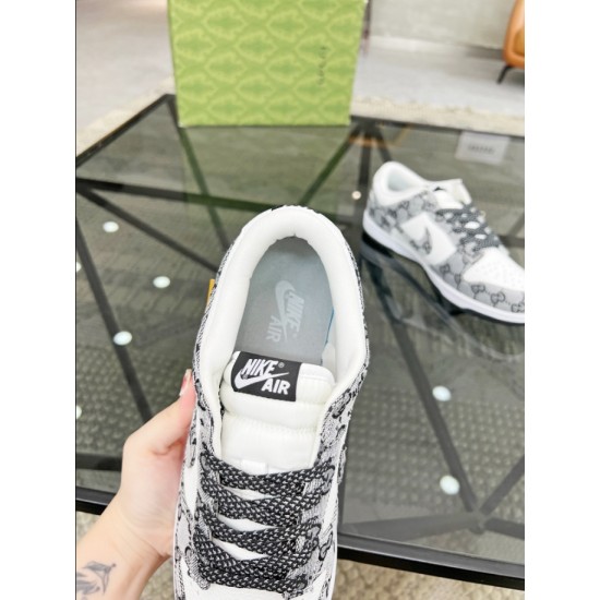 Gucci Trainers Inner Collar and Tongue View in white and black Top-down view of the collar, tongue tag and inner sole of Gucci trainers in white and black