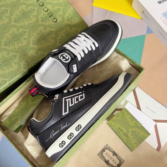 Gucci Low Top Black Leather Graphic Trainers Box Packaging Gucci Low Top Black Leather Graphic Trainers inside luxury green presentation box