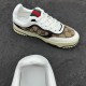 Gucci Re-Web GG Canvas Trainer Angled View in beige and white Angled top-down view of Gucci Re-Web GG Canvas Trainer in beige ebony showing green and red web tongue detail in beige and white