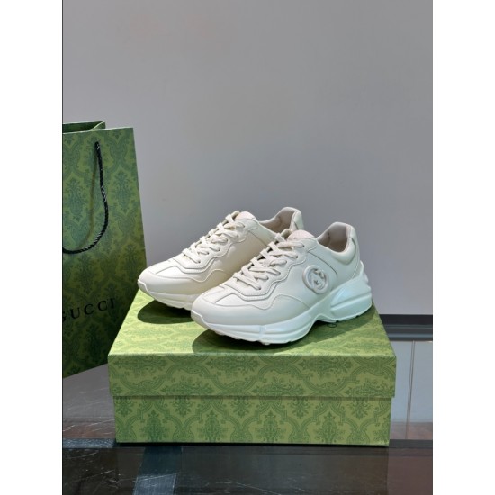 Angled perspective of pair of off-white chunky trainers on branded box