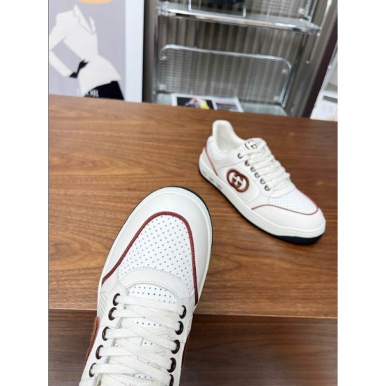 Close-up of perforated toe box on Gucci white and brown trainer