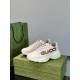 Gucci Ivory Leather Logo Printed Trainers Angled View Gucci Ivory Leather Logo Printed Trainers three-quarter view