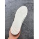 White rubber sole of Dior B23 high-top trainer showing bee motif tread