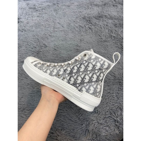 Medial side profile of Dior B23 high-top white trainer showing inner canvas pattern