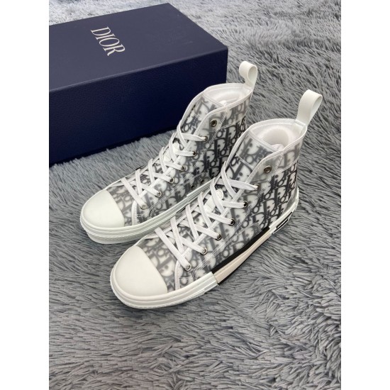 Pair of Dior B23 high-top white trainers positioned angled side by side