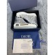 Dior B23 high-top white trainers packaged in signature blue box with accessories